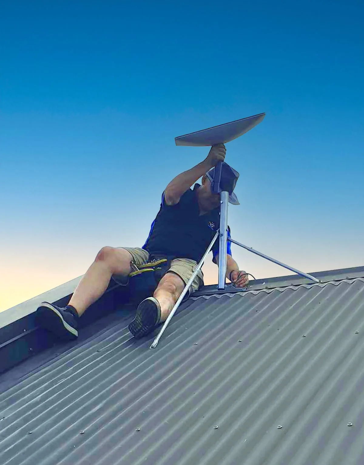 Starlink install - Glenn installing a Starlink panel